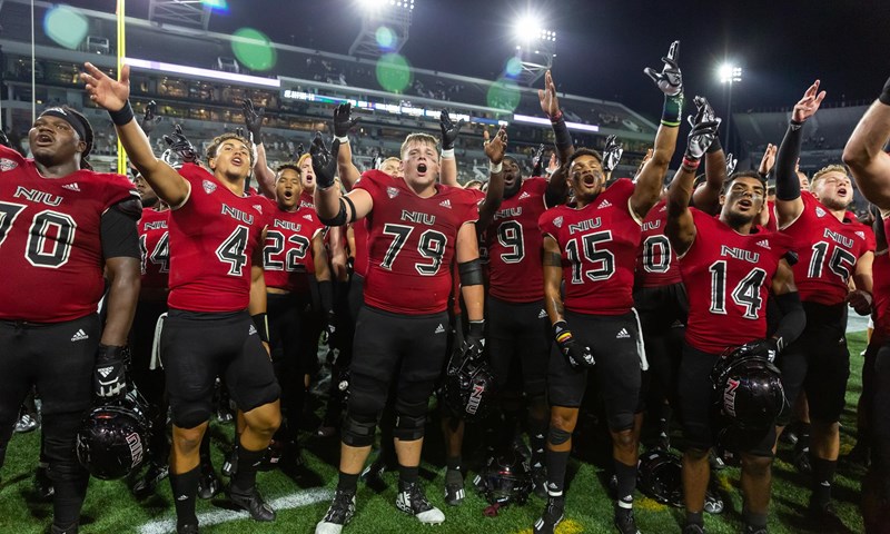 NIU Huskies in pregame huddle